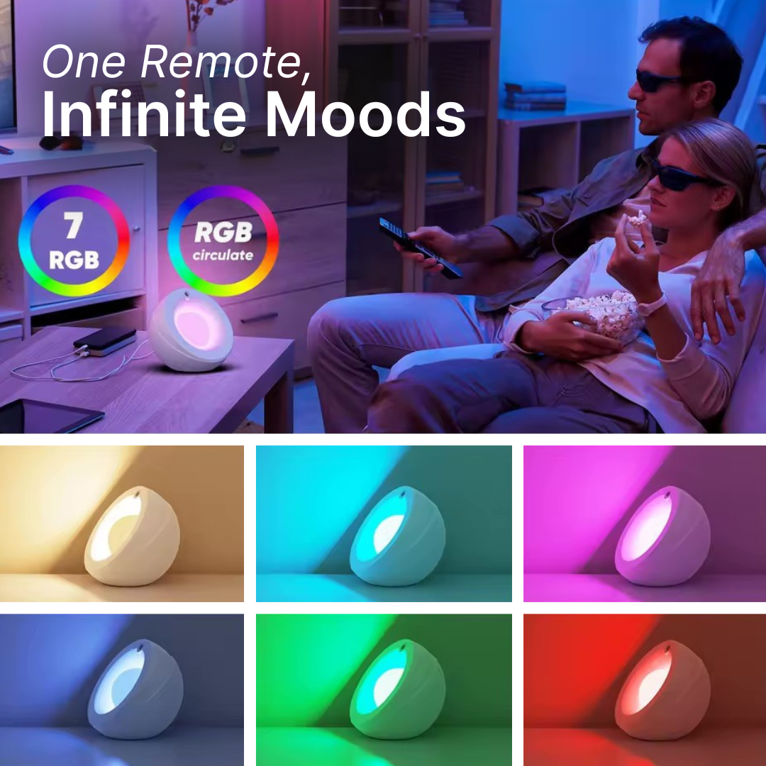 Product photograph showcasing a modern white spherical LED lamp emitting various vibrant RGB colors including pink, cyan, and red, with a couple in 3D glasses watching TV in a living room, alongside text "One Remote, Infinite Moods"